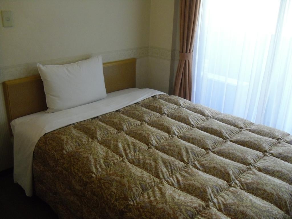 Toyoko Inn Hokkaido Sapporo-Eki Nishi-Guchi Hokudai Mae Exterior foto